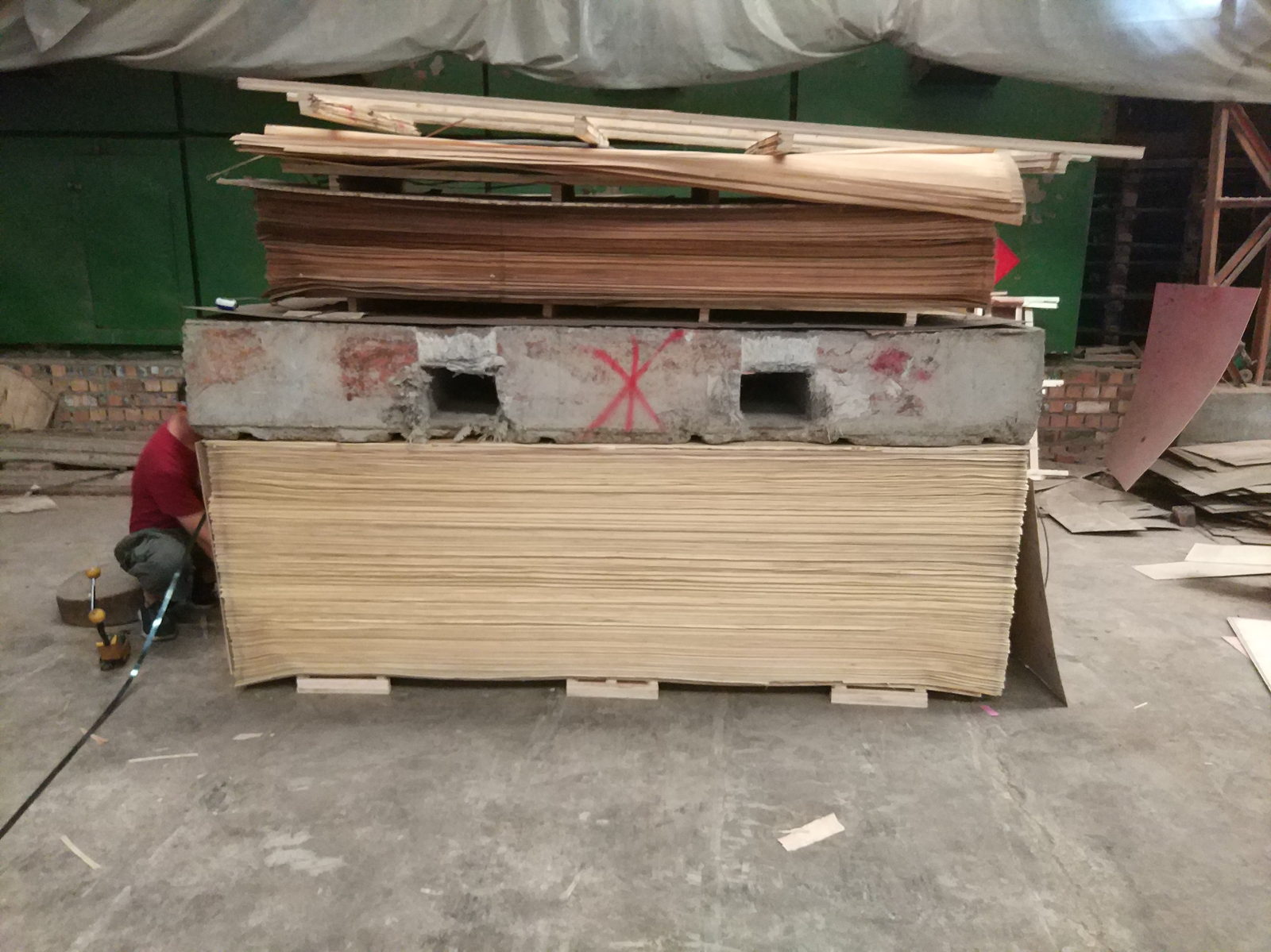 Stacked MLH veneer sheets during production handling